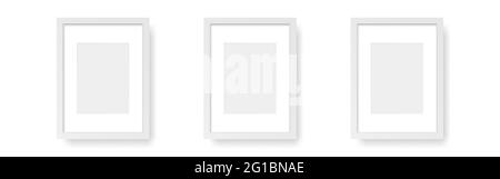 Weiße vertikale Rahmen. Wandfotos auf weißem Hintergrund. Drei leere Modelle. Elemente der Inneneinrichtung. Holzbilder mit weichem Schatten. Vektor Stock Vektor