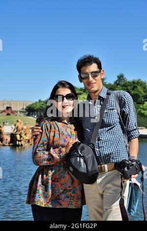 FRANKREICH, YVELINES (78) DOMAINE DE VERSAILLES, DIE GÄRTEN, IRANISCHE TOURISTEN Stockfoto