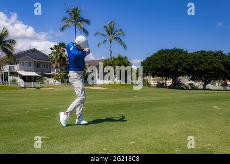 Actionaufnahmen von Golfern im Pearl Country Club, Hawaii Stockfoto