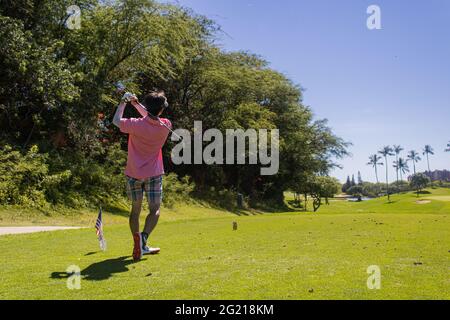 Actionaufnahmen von Golfern im Pearl Country Club, Hawaii Stockfoto
