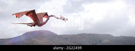 drache fliegt über einer Landschaft Stockfoto