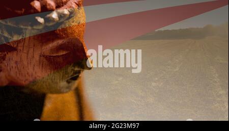 Komposition einer buddha-Figur über der amerikanischen Flagge Stockfoto