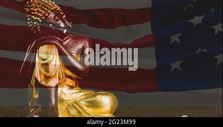 Komposition einer buddha-Figur über der amerikanischen Flagge Stockfoto