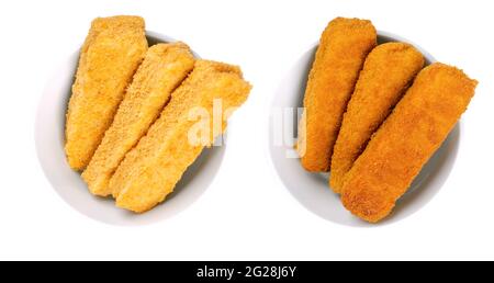 Vegane, fischlose Finger, vorgebraten und frittiert, in weißen Schalen. Fishless Sticks, basierend auf Sojaprotein, paniert und knusprig beschichtet. Fast Food. Stockfoto