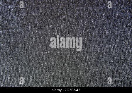 Grauer textiler Hintergrund Stockfoto