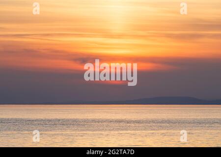 Die Sonne über hinter einer Wolke zu verschwinden - Abdeckung Stockfoto