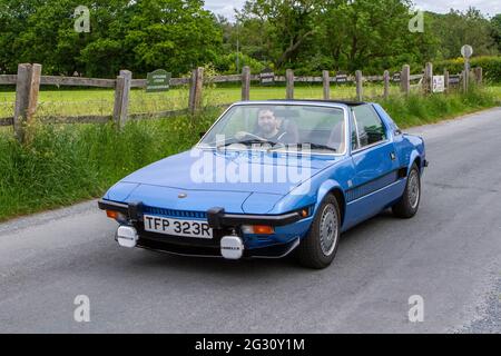 1977 70er Jahre blauer Fiat X1/9 Sportwagen beim 58. Jährlichen Manchester to Blackpool Vintage & Classic Car Run das Heritage Event ist eine ‘Touring Assembly’ Stockfoto