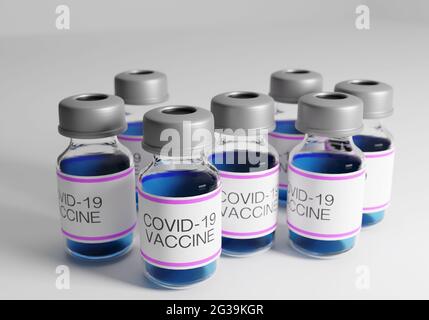 Nahaufnahme von Covid-19-Impfstoffflaschen mit weißem Hintergrund Stockfoto
