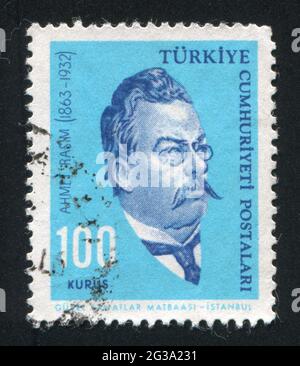 TÜRKEI - UM 1964: Briefmarke gedruckt von der Türkei, zeigt Ahmet Rasim, Schriftsteller, um 1964. Stockfoto