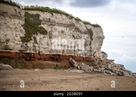 Gefallene Felsen am Hunstanton Beach, Norfolk, England Stockfoto