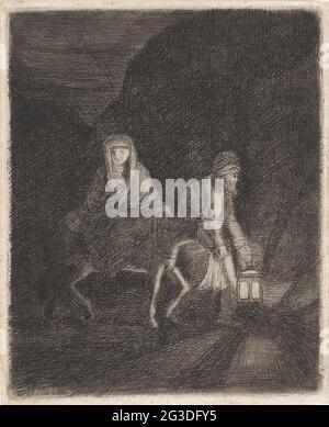 Der Flug nach Ägypten. Joseph führt den Esel mit Maria und dem Christkind durch die Dunkelheit. Er hält eine Laterne in der Hand. Stockfoto