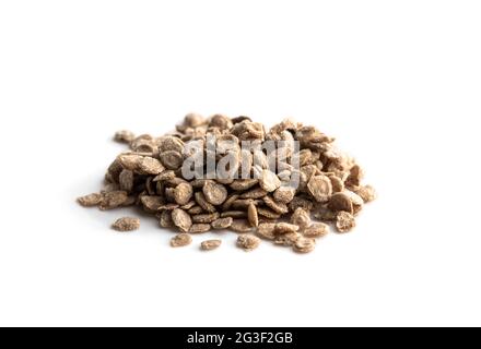 Stapel von Tomatensamen isoliert auf weiß bereit zu Pflanzen Stockfoto
