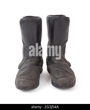 Alte Motorradstiefel Stockfoto