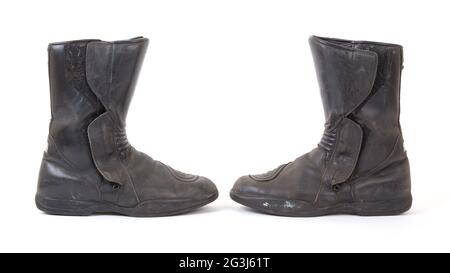 Alte Motorradstiefel Stockfoto