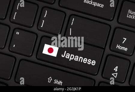 Enter-Taste mit Flagge Japan - Sprachkonzept Stockfoto