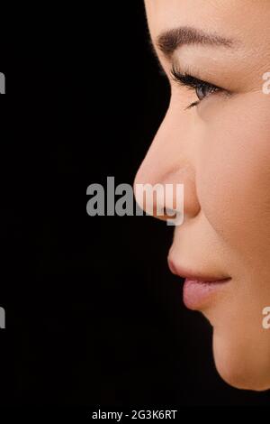 Nahaufnahme der Beutyful Asiatin in Kontakt lensas Stockfoto