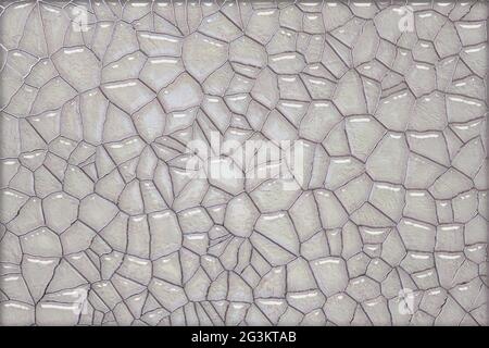 Graue rissige Wand mit Reflektionseffekt. Nahtloser abstrakter Hintergrund Stockfoto
