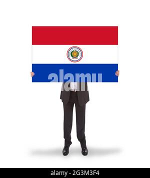 Geschäftsmann mit großer Karte, Flagge Paraguays Stockfoto