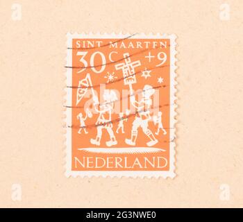 Die Niederlande 1960: einen Stempel in den Niederlanden gedruckten zeigt die niederländische Urlaub von Sint Maarten, um 1960 Stockfoto