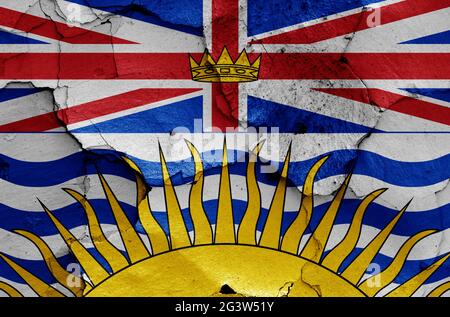 Flagge von British Columbia auf rissige Wand gemalt Stockfoto