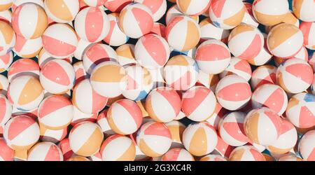 Hintergrund voller Strandbälle in Pastellfarben. 3d-Rendering Stockfoto