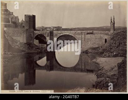 Brücke Puente de Alcántara über den Tejo in Toledo; Toledo.- Puente de Alcántara .. Teil des Reisealbums mit Bildern von Sehenswürdigkeiten in Spanien und Marokko. Stockfoto