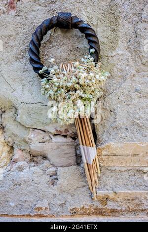 PIENZA, TOSKANA/ITALIEN - MAI 19 : Dekorative Eisenarbeiten an einer Wand in Pienza am 19. Mai 2013 Stockfoto