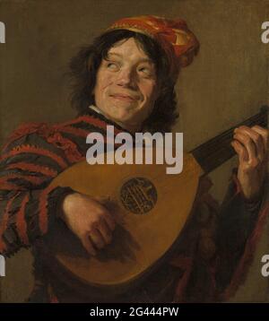 Der Lautenspieler; Der Narr. Der Narr. Lächelnder Junge mit bunten Kleidern, die auf einer Laute spielen. Alte Kopie des Originals im Louvre in Paris. Stockfoto
