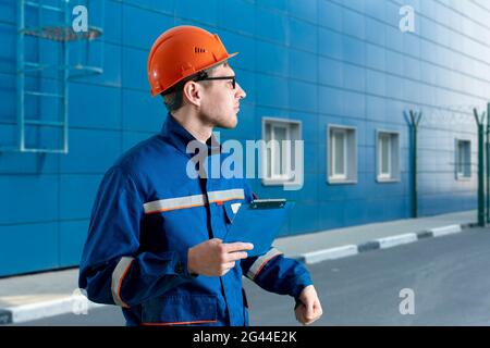 Architekt männliche Person auf dem Baugelände, Industrie-Technologie Stockfoto