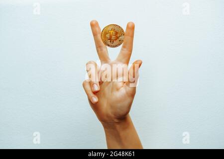 Bitcoin Siegeshand Stockfoto