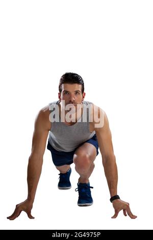 Bestimmt den Sportspieler in der Laufposition Stockfoto