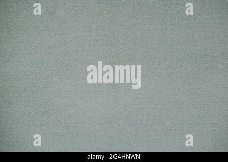 Graue, fein verputzte Wand für Texturen und Hintergründe. Feinkörnig, Oberfläche, Wand, Textur Stockfoto