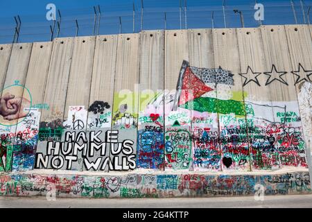 Graffiti an der palästinensisch-israelischen Grenzmauer in Bethlehem, Palästina. Westjordanland Stockfoto