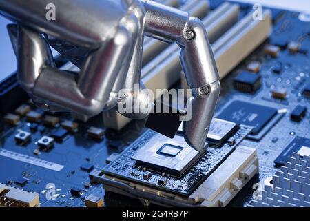 Leiterplattenchips und Manipulator Stockfoto