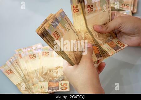 Fotografische Komposition mit Real - brasilianischem Geld Stockfoto