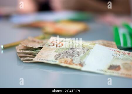 Fotografische Komposition mit Real - brasilianischem Geld Stockfoto