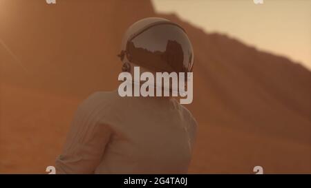 Astronaut trägt Raumanzug auf der Oberfläche des mars. Mission zum mars erkunden. Kolonisierungs- und Weltraumerkundungskonzept. 3d-Rendering Stockfoto