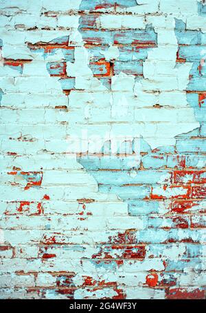 Lackspritzer spritzten lackierte Ziegelwände. Vertikaler blauer Hintergrund für digitale Grafikressourcen im mobilen Hintergrund. Stockfoto