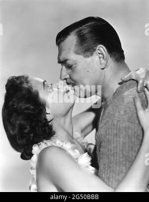 GENE TIERNEY und CLARK GABLE Unretusched Publicity Portrait in NEVER LET ME GO 1953 Regisseur DELMER DAVES aus dem Roman Come The Dawn von Paul Winterton Produzent Clarence Brown Metro Goldwyn Mayer Stockfoto