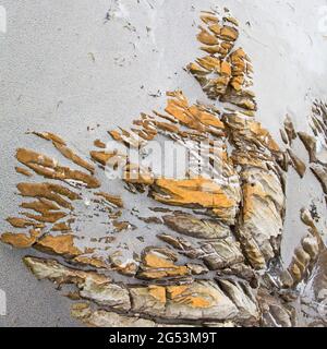 Steinmuster auf dem singenden Sand, Cleadale, Isle of Eigg, Schottland Stockfoto