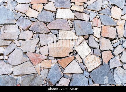 Kopfsteinpflaster Wandstruktur für Hintergründe Stockfoto