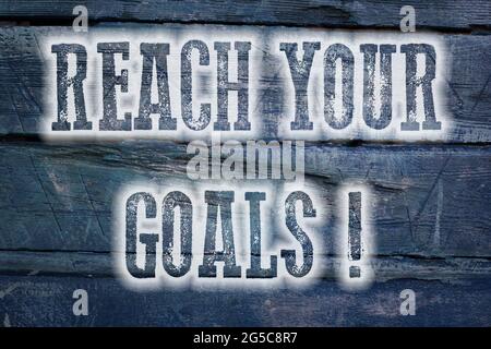 „REACH Your Goals“-Konzepttext im Hintergrund Stockfoto