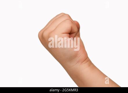 Kinder Hand zeigt Faust Geste, isoliert, weißer Hintergrund. Stockfoto