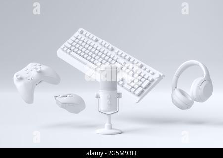 Fliegende Gamer-Gears wie Maus, Tastatur, Joystick, Headset, VR, Mikrofon Stockfoto