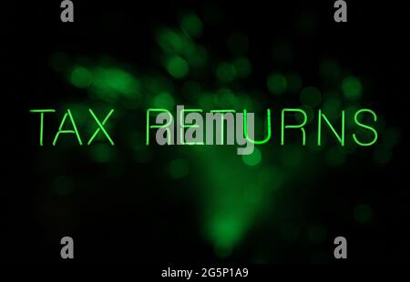Vintage Steuererklärungen Neonschild Mit Grünem Bokeh Stockfoto