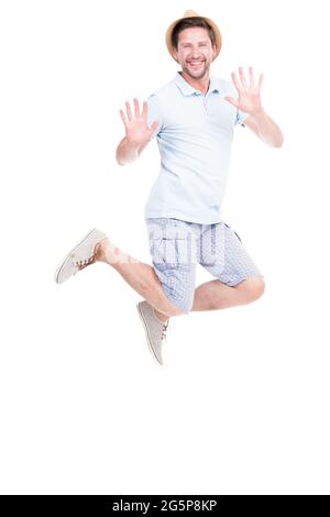 Vertikale volle Länge Seitenansicht Porträt von fröhlich hübsch bärtig kaukasischen Mann trägt Sommer-Outfit springen, weißer Hintergrund Stockfoto
