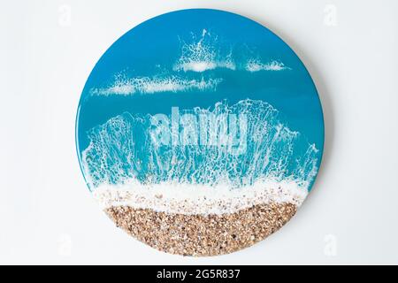 Harzkunst Pound Malerei mit Meereswellen und Strand. Ozean aus Epoxidharz Kunst Stockfoto