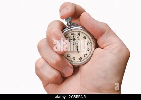 Stoppuhr in der Hand, Finger drückt eine Taste, starten, beenden, isolieren, Nahaufnahme. Stockfoto