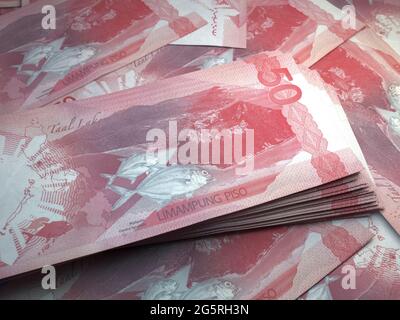 Das Geld der Philippinen. Philippinische Peso-Rechnungen. PHP-Banknoten. 50 Pesos. Handel, Finanzen, Nachrichten Hintergrund. Stockfoto