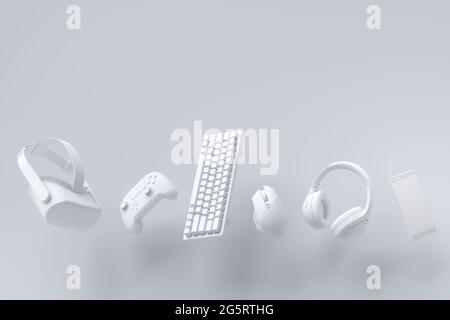 Flying Gamer Zahnräder wie Maus, Tastatur, Joystick, Headset, VR auf weiß Stockfoto